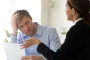 stressed out customer talking to salesperson